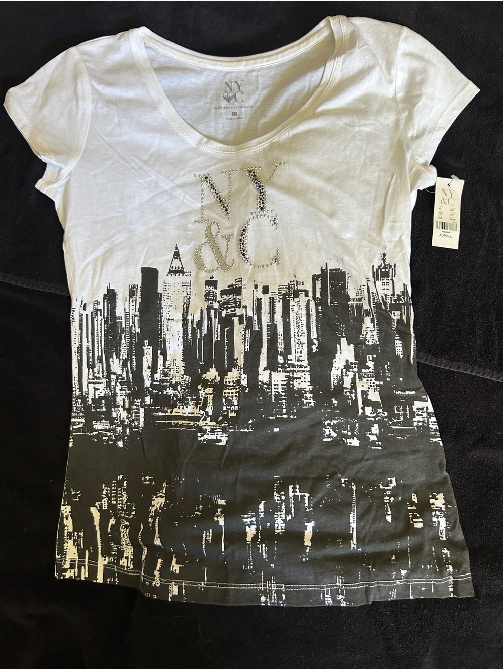 New York & Company White and Black Cityscape Scoop Neck Tee with Rhinestone Logo